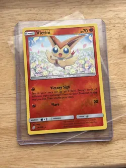 Victini 26/236 Unified Minds Reverse Holo Rare Pokemon Card NM - Image 1
