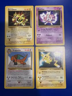 1999 Pokemon the First Movie Black Star Dragonite, Mewtwo, Pikachu, & Electabuzz - Image 1
