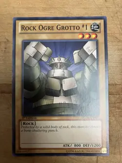Yugioh! LP Rock Ogre Grotto 1 - LCJW-EN005 - Common - 1st Edition Lightly Played - Image 1