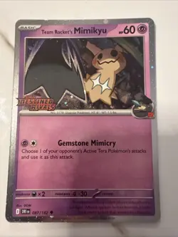 Team Rocket’s Mimikyu 087/182 Stamped Holo Destined Rivals Pokemon Card - Image 1