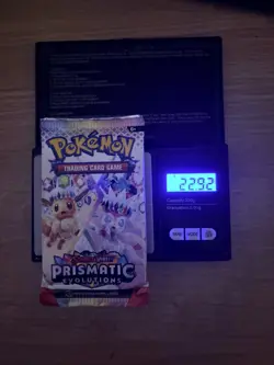 Pokemon TCG Prismatic Evolutions HEAVY Booster Pack 22.92g - Possible God PackU - Image 1