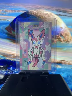 Floating Sylveon - Star Holo - Let's Go Eevee Database - Pokemon Card - Image 1