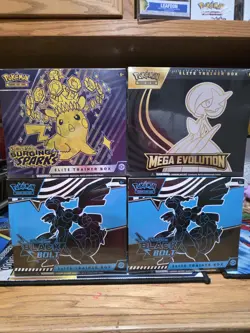 Pokemon Lot - 4 ETB - Black Bolt Surging Sparks Mega Evo 1 Has Small Tear - Image 1