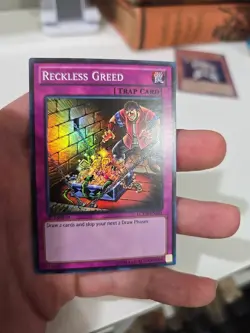 Yugioh Reckless Greed LCYW-EN285 Super Rare 1st Ed LP - Image 1