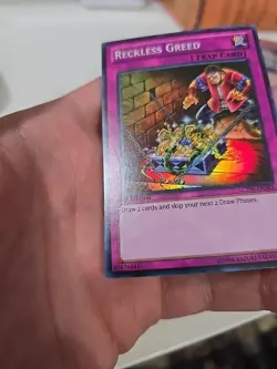 Yugioh Reckless Greed LCYW-EN285 Super Rare 1st Ed LP - Image 2