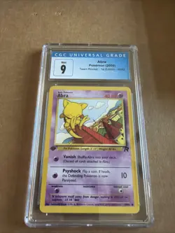 CGC 9 MINT Abra Team Rocket 1st Edition 49/82 Pokemon Card - Image 1