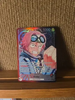 One Piece CCG Koby OP11-001 Alternative Art Leader a Fist of Divine Speed - Image 1
