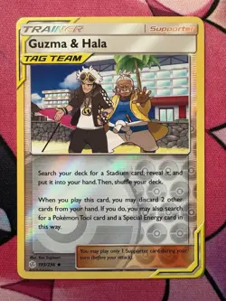Pokemon Cosmic Eclipse - Guzma & Hala - Rev Holo Supporter NM - Image 1