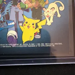 1999 Topps Pokemon Series 1 TV Animation Checklist red/pink Logo - Image 3