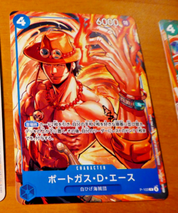 ONE PIECE JAPANESE CARD GAME CARTE Portgas D.Ace P-103 TCG JAPAN MINT - Image 1