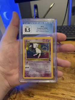 CGC 8.5 NM/ MINT + Pokemon Mew #9 Holo Black Star Promo 2000 League Rare W Swirl - Image 1