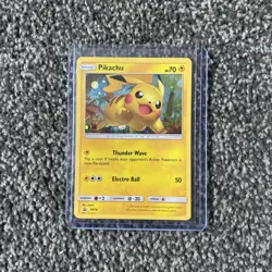 Pikachu SM76 Sun & Moon Holo Rare Black Star Promo Pokemon Card With Swirl - Image 1