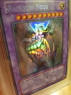 Yu-Gi-Oh! 2008 Rainbow Neos PTDN-EN044 PSA 8 NM-Mint 1st Edition Ghost Rare - Image 2