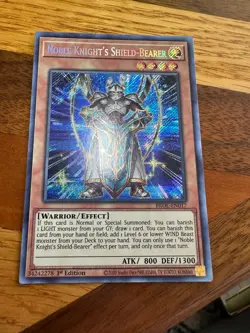 Noble Knight's Shield-Bearer BROL-EN017 1st Edition Secret Rare LP + BONUS - Image 1