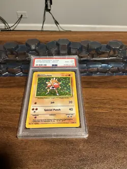 1999 Pokemon Game Base Set Unlimited #7 Hitmonchan Holo PSA 8 NM-MT - Image 1