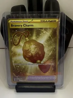 Pokemon Trainer Tool Bravery Charm Gold 173/193 NM/Mint Condition - Image 1