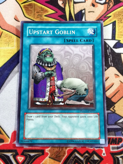 Upstart Goblin dlg1-en057 (LP/MP) Common Yu-Gi-Oh! - Image 1
