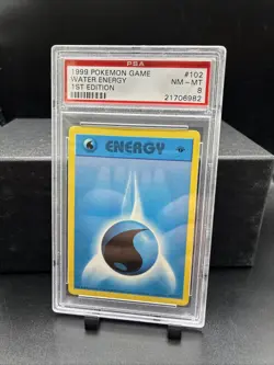 Pokemon Water Energy 1st Edition 102/102 Pokemon WOTC 1999 Vintage PSA 8 Graded - Image 1