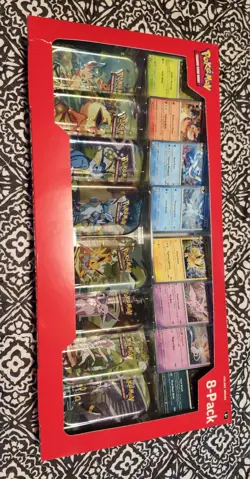 Pokemon Prismatic Evolutions Costco Exclusive 8 Pack Mini Tin Bundle - Image 1