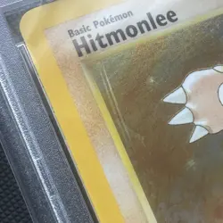 1999 Pokemon Fossil 1st Edition Hitmonlee Holo 7/62 PSA 8 Graded - Case Scratch - Image 3