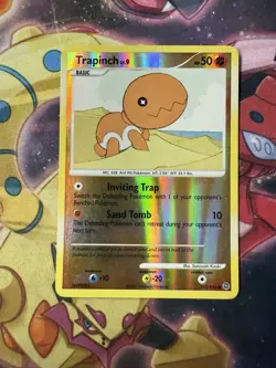 Trapinch 115/132 Reverse Holo Secret Wonders Pokemon Card LP - Image 1