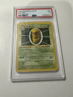 1999 Pokemon Base Set 1st Edition Kakuna PSA 1 - Image 1