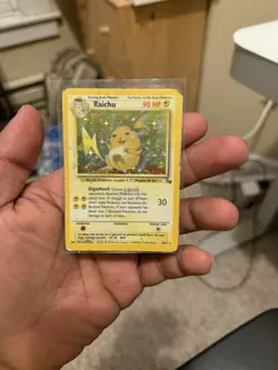 Pokemon TCG Raichu Fossil Holo Card 14/62 Unlimited Holo Rare - Image 1