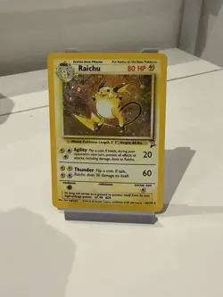 Pokemon TCG Raichu Holo Card 16/130 Base Set 2 Swirl Unlimited Holo Rare MP - Image 1