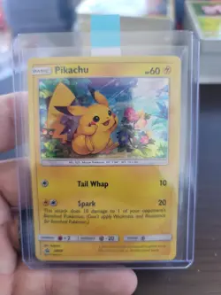 Pokemon Pikachu Black Star Promo SM86 Cosmos Holo - Image 1
