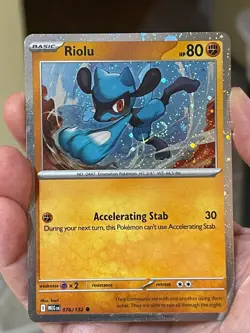 POKEMON RIOLU 076/132 COMMON COSMOS HOLOFOIL WITH SWIRL MEGA EVOLUTION NM CARD - Image 1