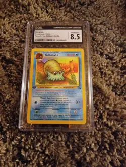 POKEMON OMANYTE FOSSIL 52/62 1ST EDITION WOTC CGC 8.5 GRADED NM-MINT + - Image 1