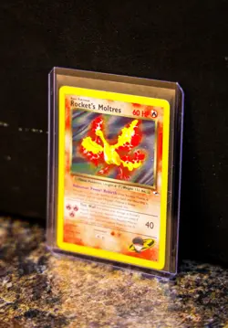 Rocket's Moltres 012/132 Gym Heroes Rare Holographic Pokemon Card - Image 4