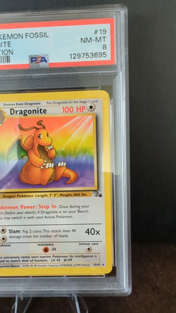1999 POKEMON TCG FOSSIL #19 DRAGONITE 1ST EDITION - PSA 8 NM-MT - Image 2
