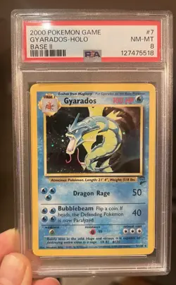 Pokemon Gyarados Holo Unlimited Rare Card 7/130 Base Set 2 PSA 8 - Image 1