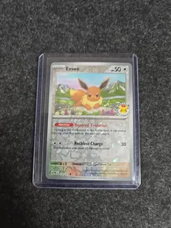 Eevee - (Pokemon Day 2025) (Reverse Cosmos Holo) 074/131 Reverse Holo - Image 1