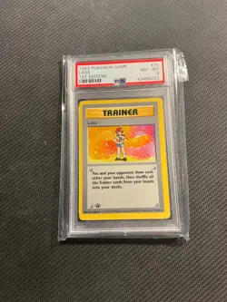 PSA 8 Lass Pokemon Card 1st Edition Base Shadowless - Image 1