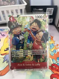 Carrying On His Will #OP13-007 Ace & Sabo & Luffy SR - Image 1