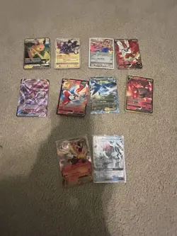 10 Pokemon Cards Including Gx’s, V’s, And Base Cards All In Near Mint Condition - Image 1