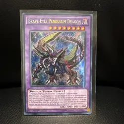 YuGiOh Brave-Eyes Pendulum Dragon Secret Rare 1st Edition RATE-EN039 - Image 1