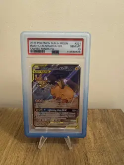 2019 Pokemon Sun & Moon Unified Minds Raichu Alolan Tag Team GX #221/236 PSA 10 - Image 1