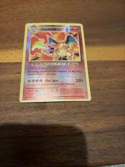 Pokemon TCG Charizard Holographic Trading Card Stage 2, 150 HP, 200 Fire Spin - Image 1