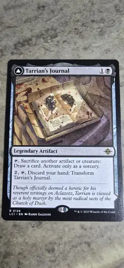 Tarrian's Journal The Lost Caverns of Ixalan Regular Legendary Artifact MTG NM - Image 1