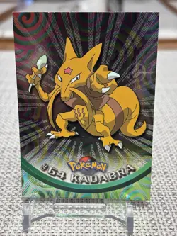 1999 Topps Pokemon Series 1 #64 Kadabra (Sunrays Foil) TV Animation Black LP - Image 1