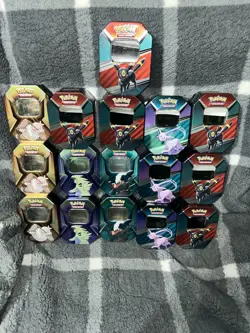 (Lot of 16) Empty Pokemon Tins - Sylveon, Umbreon, Tyranitar, Sloking, Darkrai - Image 1