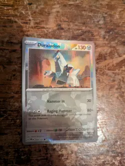 Pokemon TCG Duraludon 069/131 Common Holo Prismatic Evolutions Card Pokeball - Image 1