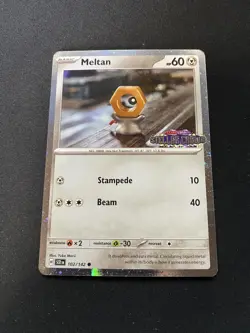 Pokemon TCG Meltan Cosmos Holo 102/142 Stellar Crown Stamped Promo Card - Image 1