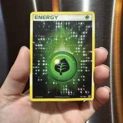 Grass Energy Holo Rare Pokemon trading card from the 2005 EX Emerald set. - Image 1