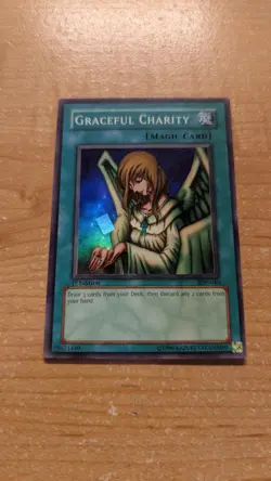 Graceful Charity - SDP-040 - 1st Edition Super Rare - Near Mint NM Magic Card - Image 1