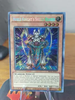 Yugioh! Noble Knight's Shield-Bearer - BROL-EN017 - Secret Rare - 1st Edition LP - Image 1