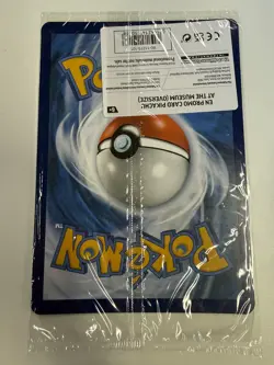 Pokemon x Natural History Museum Pikachu Jumbo Promo Card in hand - Image 2
